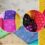 “Close-up of colorful Indian fabrics including silk, cotton, and chiffon”